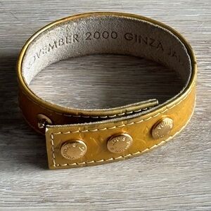 Louis Vuitton Mustard Yellow Leather Snap Bracelet Gold-Tone Logo Studs w/ COA